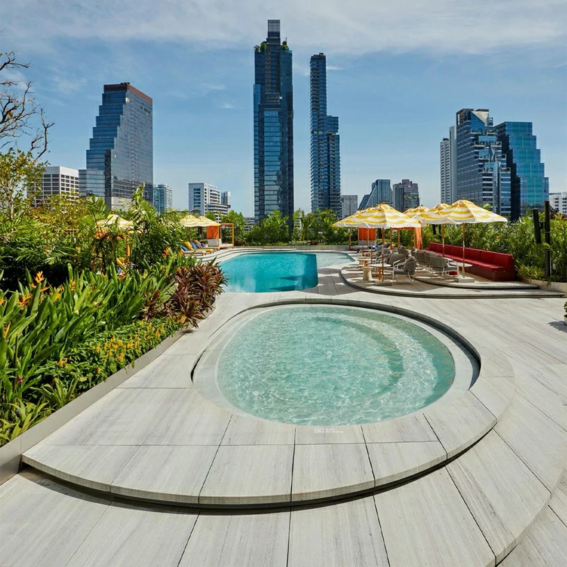 Top Interior Designers Favorite Wood and Marble Styles for 2025 2 Wooden White Marble Hotel Outdoor Swimming Pool Projects