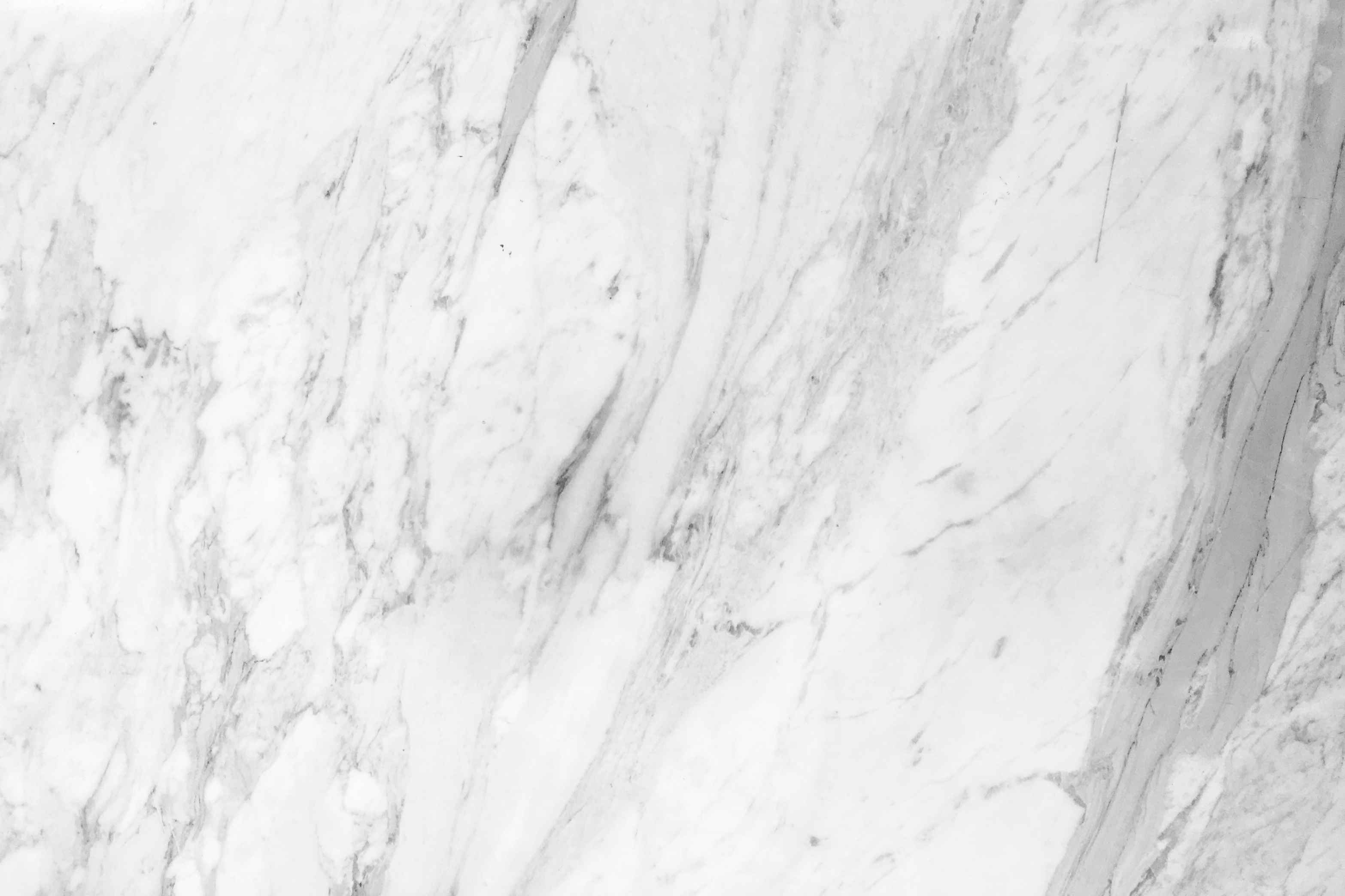 White Serpeggiante Marble Slab in a Modern Kitchen